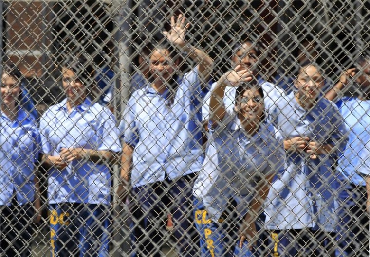 File photos Mothers watch their children arriving to visit at California Institute for Women state prison in Chino California