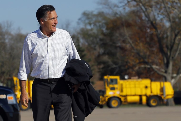 Republican presidential nominee Mitt Romney gets off his campaign plane in Moline