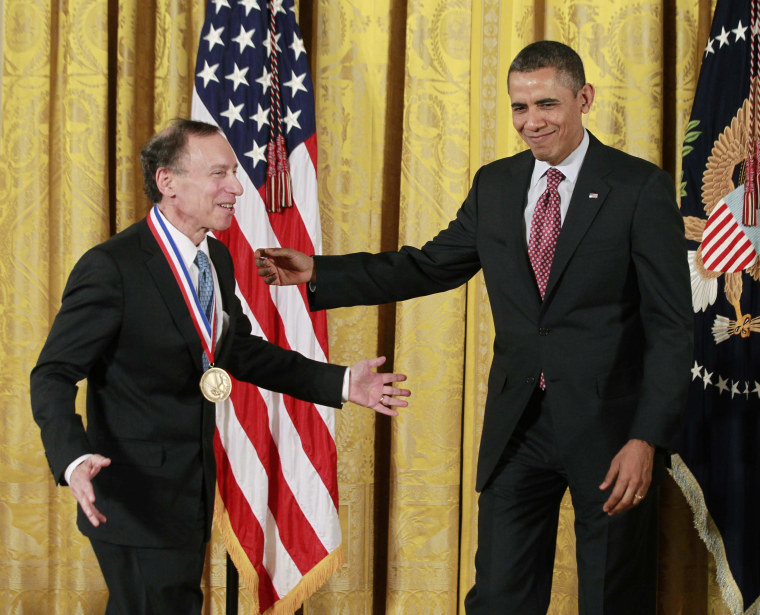 U.S. President Obama gets ready for a picture with National Medal of Technology and Innovation recipient Dr. Robert Langer from the Massachusetts Institute of Technology during a ceremony in the East Room of the White House in Washington