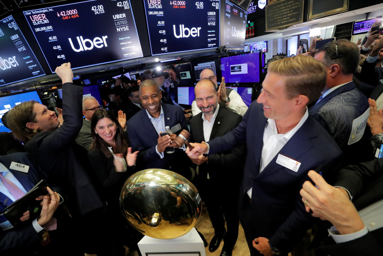 Image: Uber Technologies Inc. CEO Dara Khosrowshahi and co-founder Ryan Graves ring bell on trading floor of NYSE during the company's IPO in New York