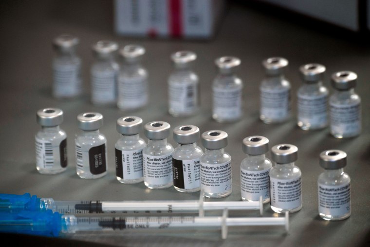 Image: Syringes and vials of the Pfizer-BioNTech Covid-19 vaccine