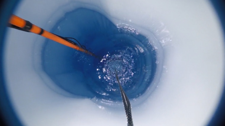 After lowering the sediment corer through the borehole, the scientists then lowered it through about 1,600 feet of seawater below the floating ice shelf.