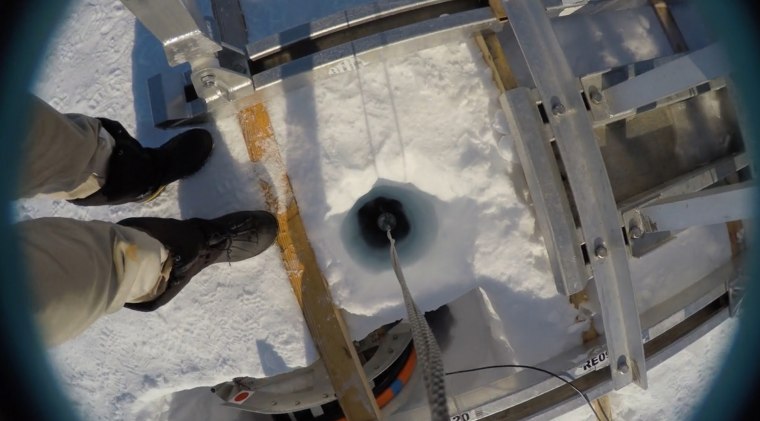 The geologists used hot-water equipment to drill the borehole through more than half a mile of the ice shelf, on the southern edge of Antarctica's Weddell Sea.
