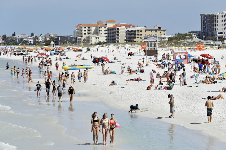 Image: Visitors at Clearwater Beach, Fla.,