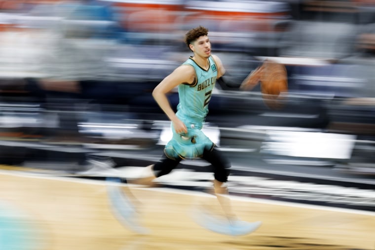 LaMelo Ball #2 of the Charlotte Hornets brings the ball up court during the third quarter of their game against the Golden State Warriors at Spectrum Center on Feb. 20, 2021 in Charlotte, N.C.