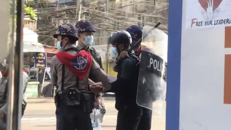 Associated Press journalist Thein Zaw is arrested by police in Yangon, Myanmar.
