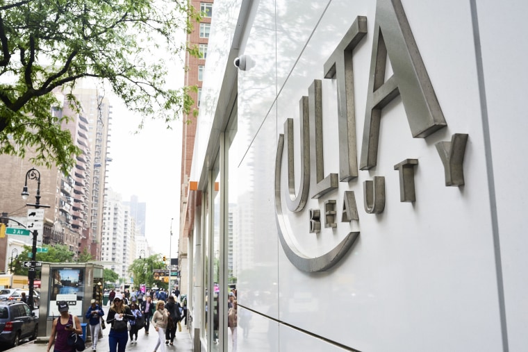 Pedestrians pass in front of an Ulta Beauty Inc. store in New York, on Thursday, May 31, 2018.