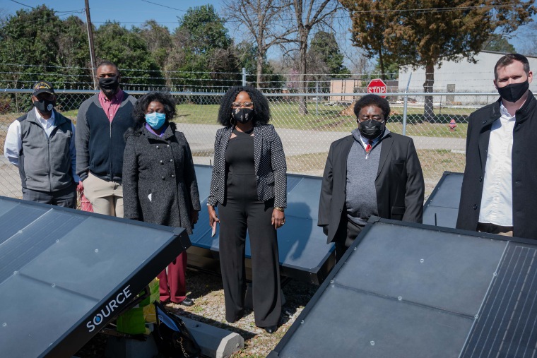 South Carolina State Rep. Robert Williams, left; Xavier Boatright of All Aboard for Justice; Mayor of Florence Teresa Myers Ervin; Dr. Florence Anoruo of South Carolina State University, Rev. Leo Woodberry, pastor, Kingdom Living Temple; Colin Goddard, director, SOURCE Global at the church's initial installation of hydropanels.