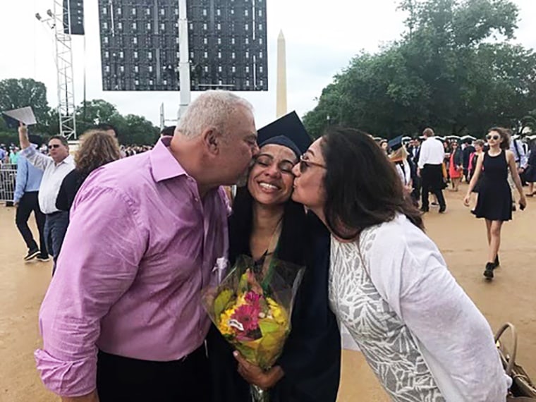 Monica Mann with her parents.