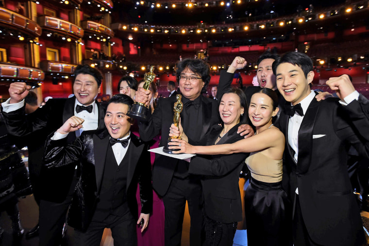 Image: Bong Joon Ho and the cast of "Parasite" pose at the 92nd Academy Awards in Los Angeles on Feb. 9, 2020.