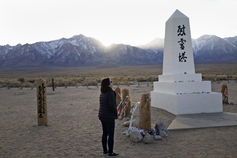 Image: Lori Matsumura visits the cemetery at the Manzanar National Historic Site near Independence, Calif., on Feb. 17, 2020.