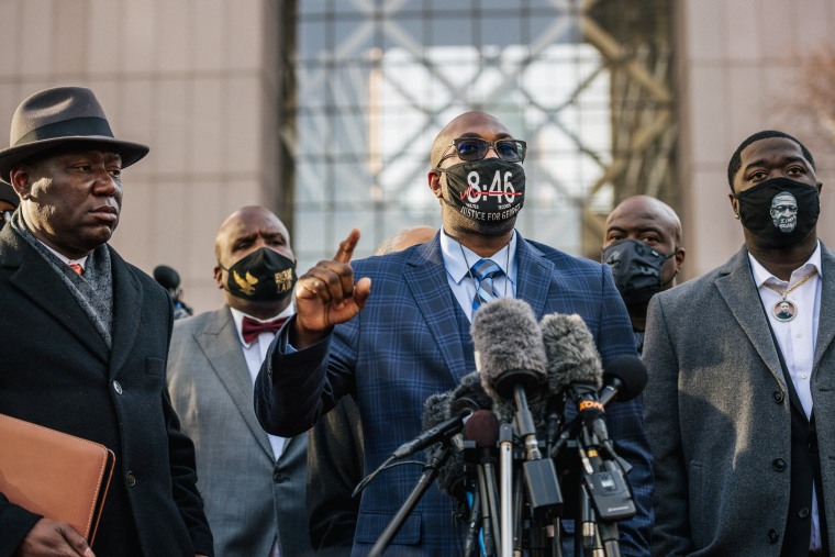 Image: Philonise Floyd, brother of George Floyd, speaks alongside attorney Ben Crump, left, and Brandon Williams, nephew of George Floyd, during a news conference outside the Hennepin County Government Center on March 29, 2021 in Minneapolis.