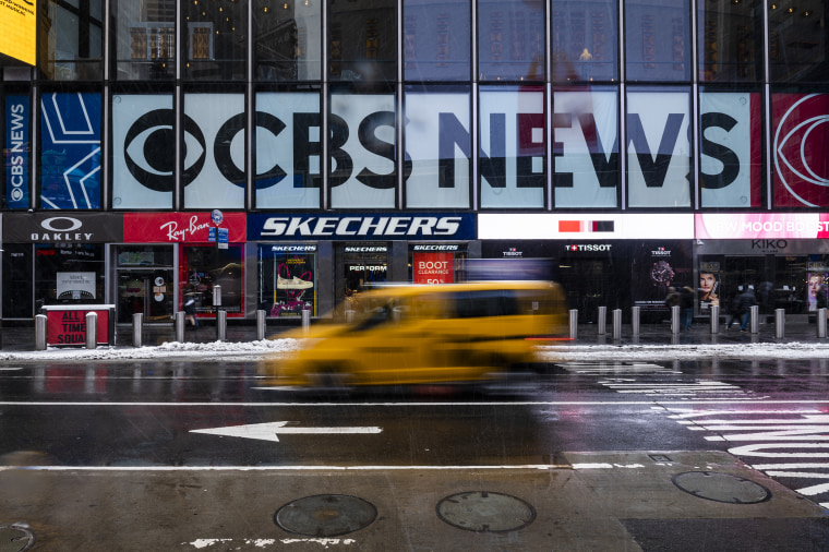 Image: A taxi drives past CBS News signage on the ViacomCBS headquarters in New York, on Feb. 19, 2021.