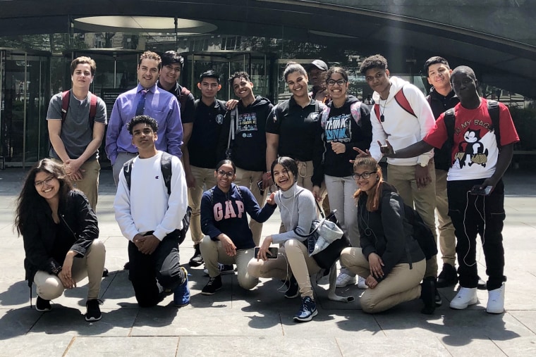 Alejandro Mundo and his classroom students outside the Rose Center for Earth and Space in 2019.
