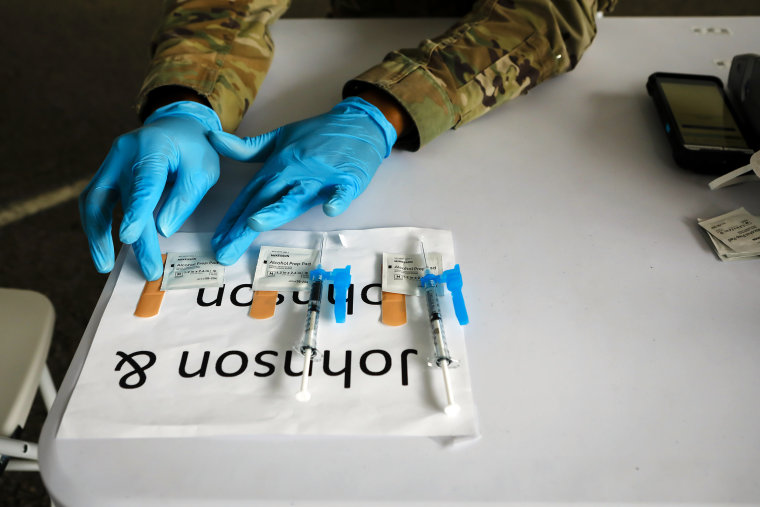 Image: A U.S. Army soldier prepares to administer Johnson & Johnson Janssen Covid-19 vaccines at a vaccination center at the Miami Dade College North Campus in North Miami on March 10, 2021.