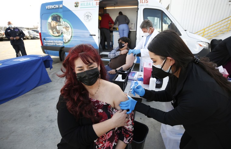 The city of Vernon demonstrates the use of special refrigeration to store Pfizer COVID-19 vaccine as they city is using a van to operate a mobile clinic and provide vaccination to frontline workers at various food and industrial plants in the city.