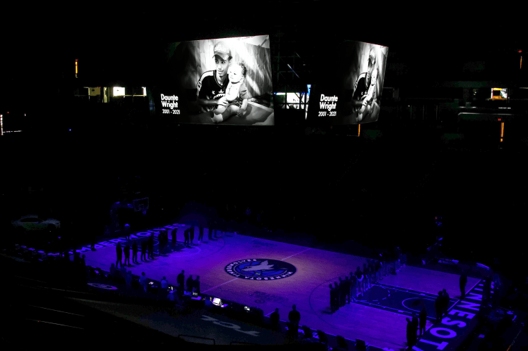Image: A moment of silence is held for Daunte Wright before the start of the game between the Brooklyn Nets and Minnesota Timberwolves at Target Center on April 13, 2021 in Minneapolis.