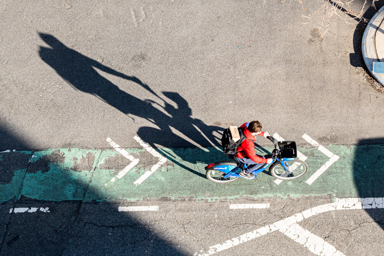 Image: A person rides a Citi Bike in Kips Bay on March 19, 2021 in New York City.