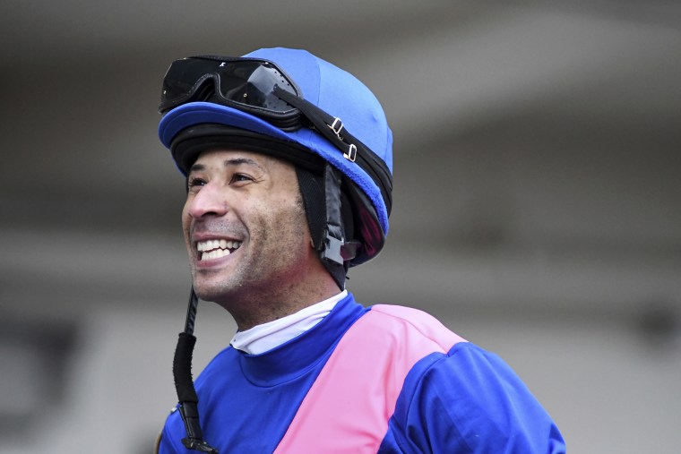 Kendrick Carmouche smiles in the paddock at Aqueduct Racetrack in the Queens borough of New York on Jan. 24, 2020.