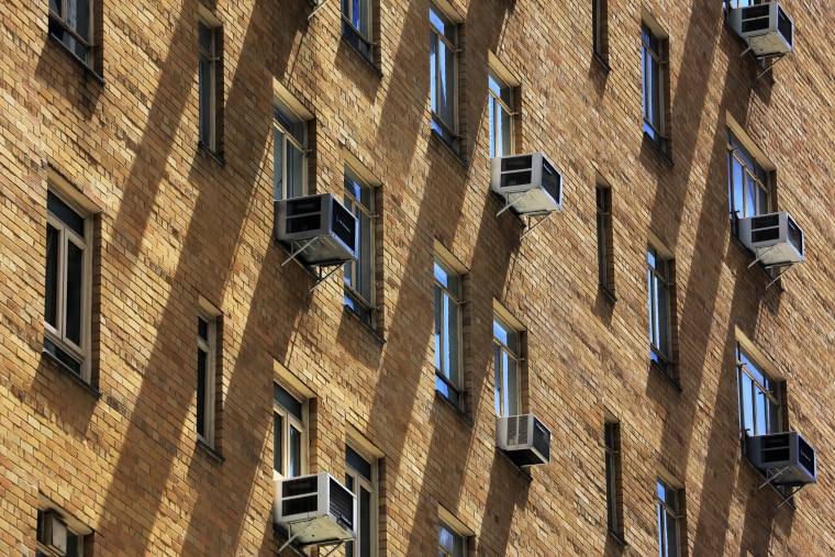 Air conditioners adorn a building in New York.