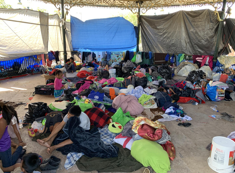 Image: A makeshift camp in a central plaza in Reynosa, Mexico.