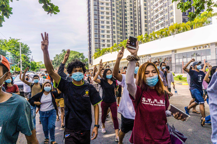 Image: Protesters make the three-finger salute during a demonstration against the military coup in Yangon, Myanmar on May 15, 2021.