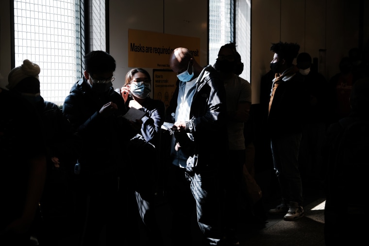 Image: People wait in line to get a Covd-19 vaccine at the Broadway Junction subway station in Brooklyn on May 12, 2021.