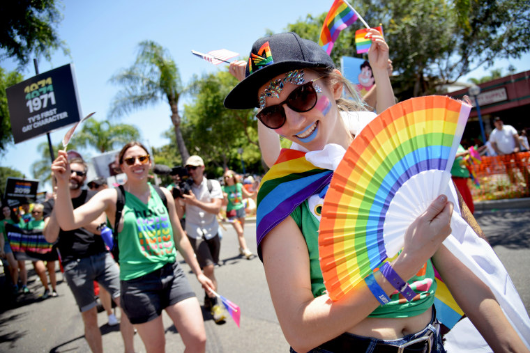 People march in the 50th annual Pride parade on June 9, 2019 in West Hollywood, Calif.