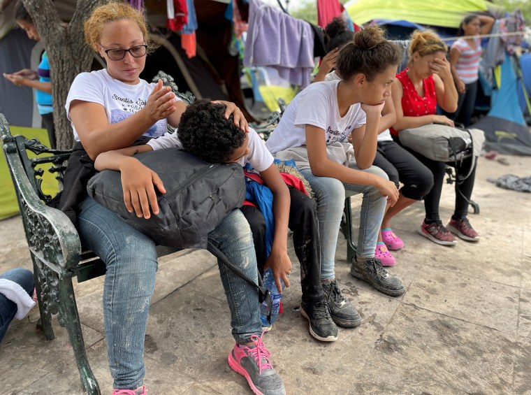 Image: Jeny,  stranded with her son and daughter in Reynosa, says gangs in Honduras killed her father and brother this year.