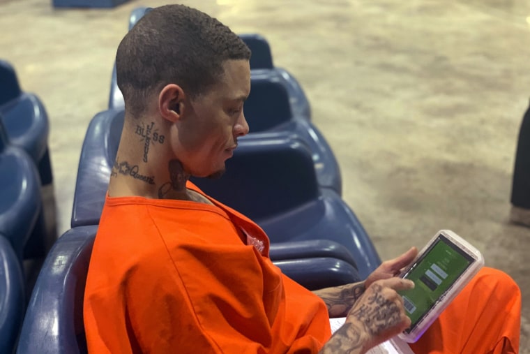 Inmate Byron Robinson works on a new Securus tablet on June 9, 2021.