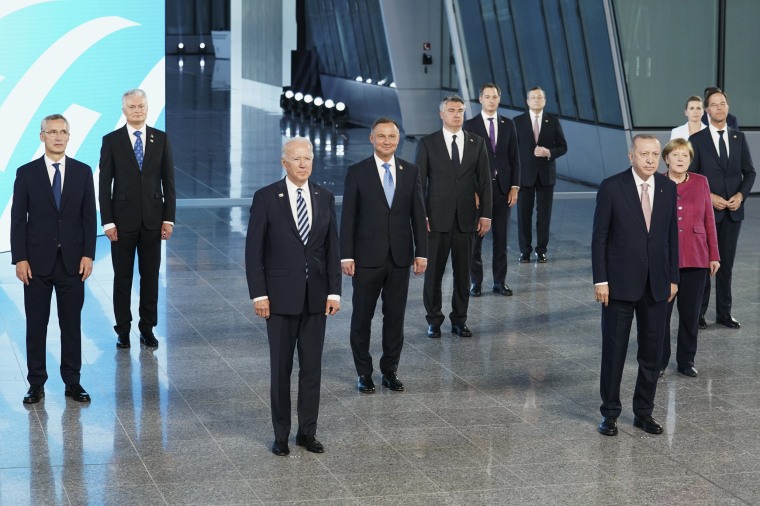 President Joe Biden and other NATO heads of the states and governments pose for a family photo during the NATO summit at the Alliance's headquarters, in Brussels, on June 14, 2021.