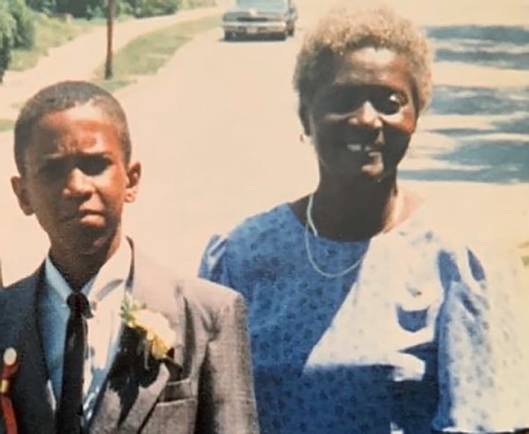 Walter Bernie Jackson Jr., with his grandmother Susie J. Jackson, one of the Emanuel Nine victims, at his eighth grade graduation ceremony.