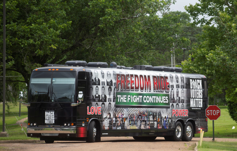 Image: People gather during the launch of the Freedom Ride for Voting Rights Bus Tour on Juneteenth in Jackson
