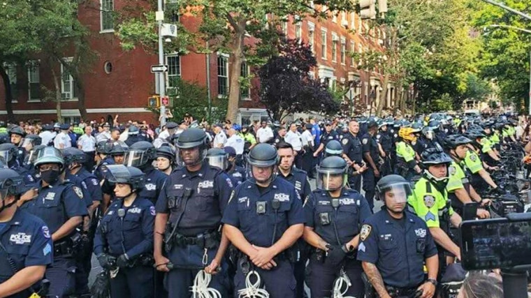 New York Police Department officers at an intersection near the north side of Washington Square Park on June 27, 2021.
