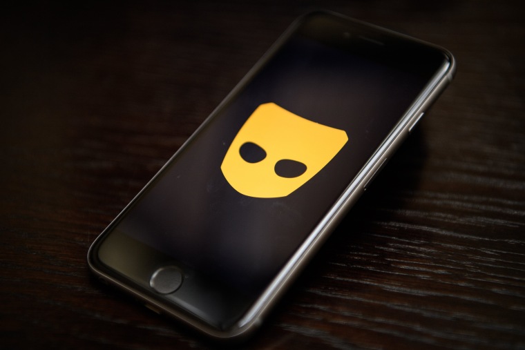 The "Grindr" app logo on a cellphone screen.  