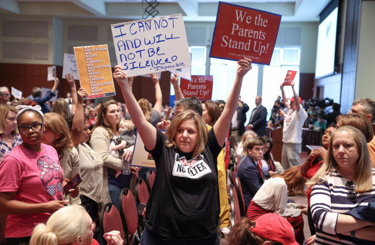 Image: A Virginia School board meeting reflects a battle playing out across the country over a once-obscure academic doctrine known as Critical Race Theory, in Ashburn