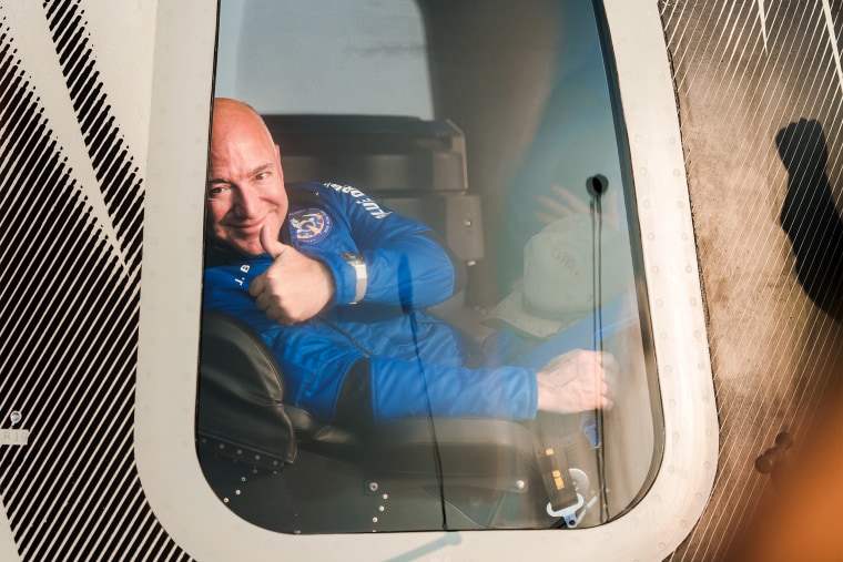 Jeff Bezos gives the “thumbs up” after returning from space on July 20, 2021.