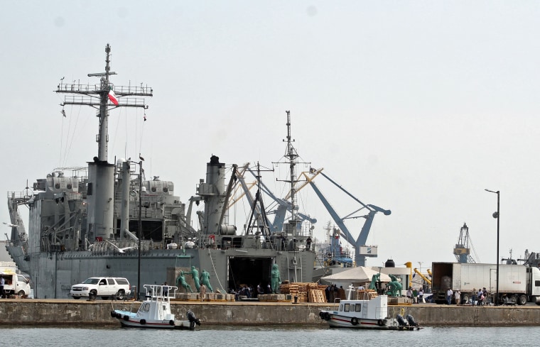 Image: Members of the Mexican Navy load humanitarian aid including medical supplies for Cuba in Veracruz, Mexico, on July 24, 2021