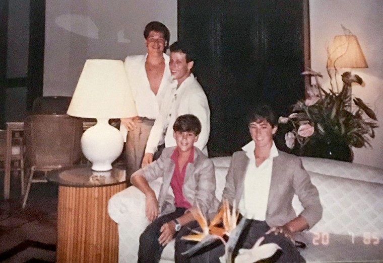 Richard Kleiman, left, and his friend Jay Kleiman, right, with Tommy and Michael Babi, both sitting, in Dorado, Puerto Rico, around 1985.