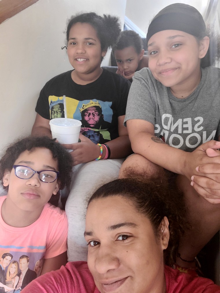 Image: Kinisha Carey (bottom) with her children (left to right): Kennedy, 10;  Kori, 12; Cai, 6; and Kadence, 16.