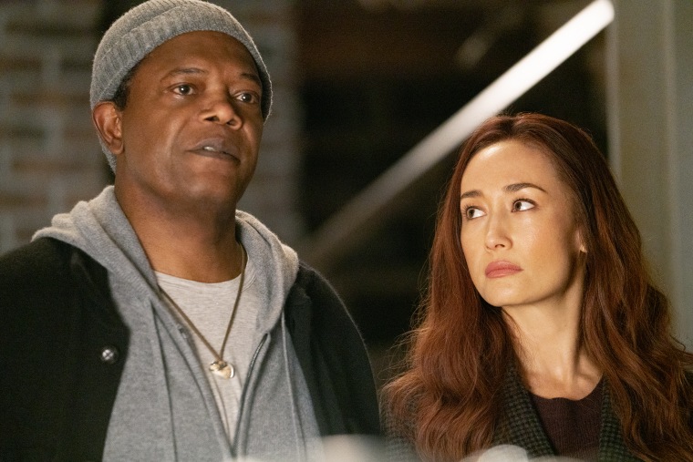 Samuel L. Jackson as Moody and Maggie Q as Anna in "The Protégé."