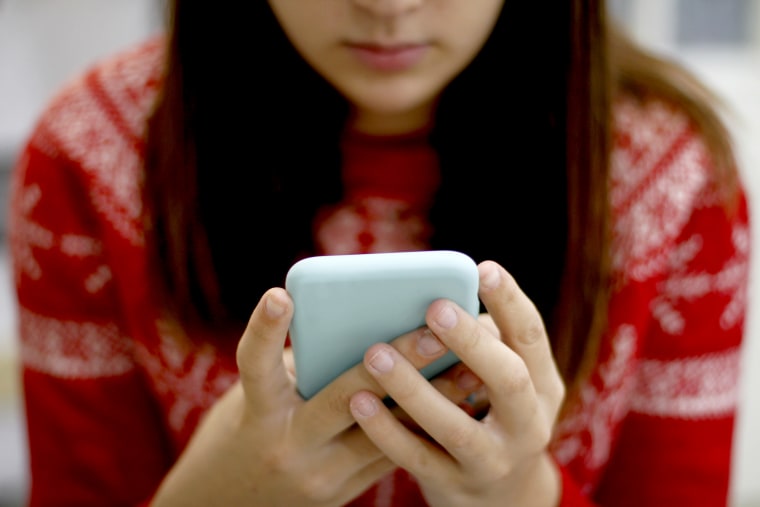 Young Woman Using Smart Phone