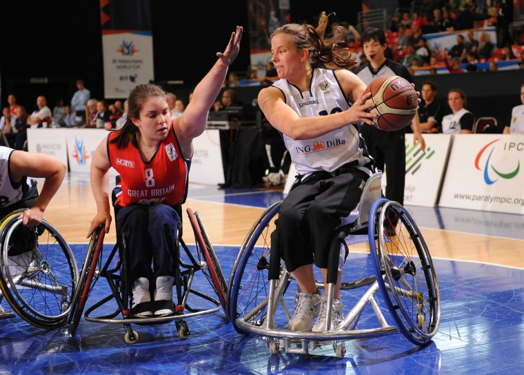 Great Britain's Laurie Williams, left, and Germany's Gesche Schunemann during the wheelchair basketball event at the Paralympic World Cup in 2011.