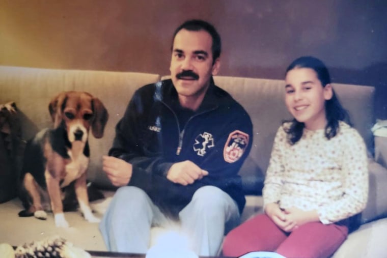 A picture of Devyn with her father, around the time of 9/11.