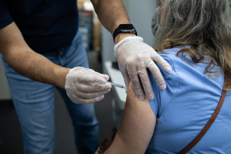 Photo: A Pharmacy Administers Third Doses Of Covid-19 Vaccines