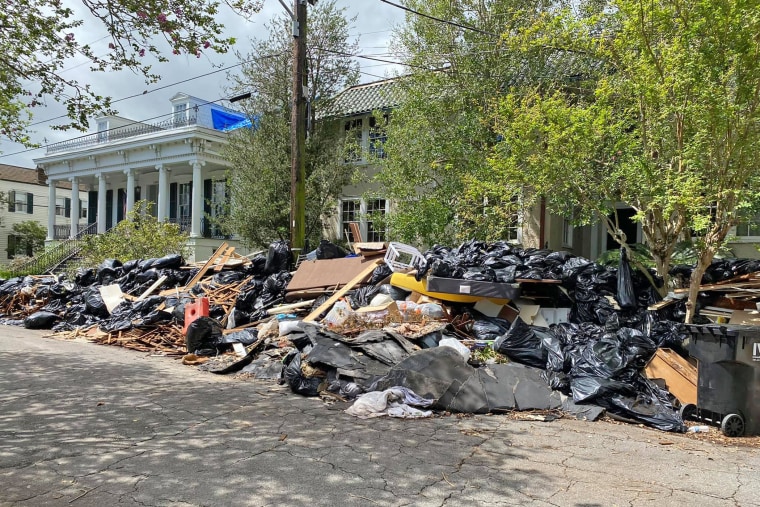 Image: Trash piled up on Bordeaux between St Charles and Pitt in New Orleans on Sept.16, 2021.