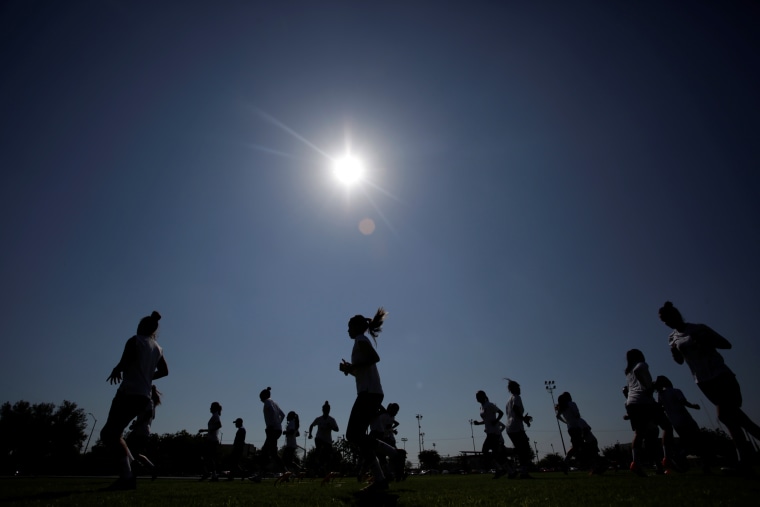 Image: Female soccer players take part in a training session