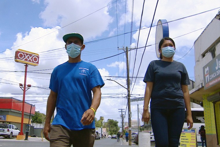 Berta runs errands with a fellow Honduran to avoid walking alone.