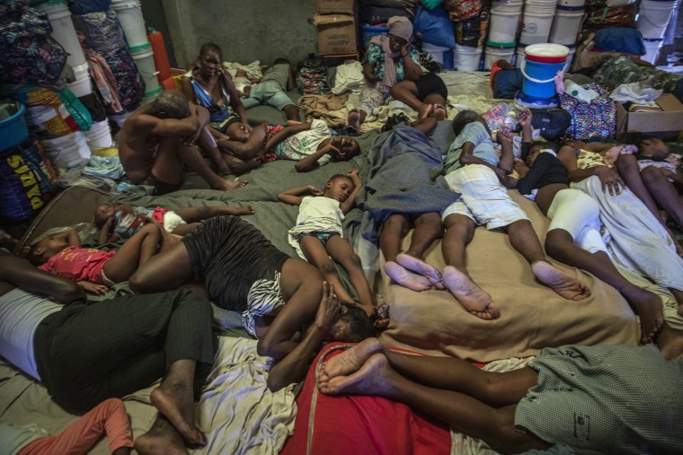 Internally displaced people sleep inside a school converted into a shelter in Port-au-Prince, Haiti, on Sept. 16, 2021.