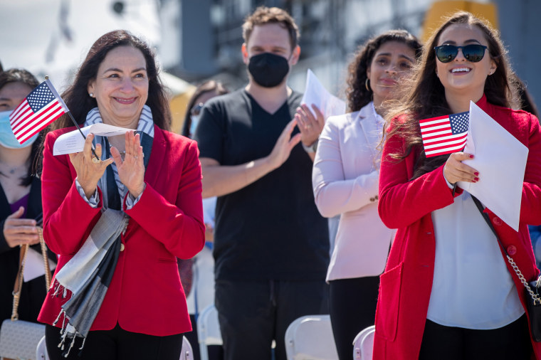 New American citizens at a naturalization ceremony on the flight deck of the USS Hornet museum in Alameda, Calif., on July 2.